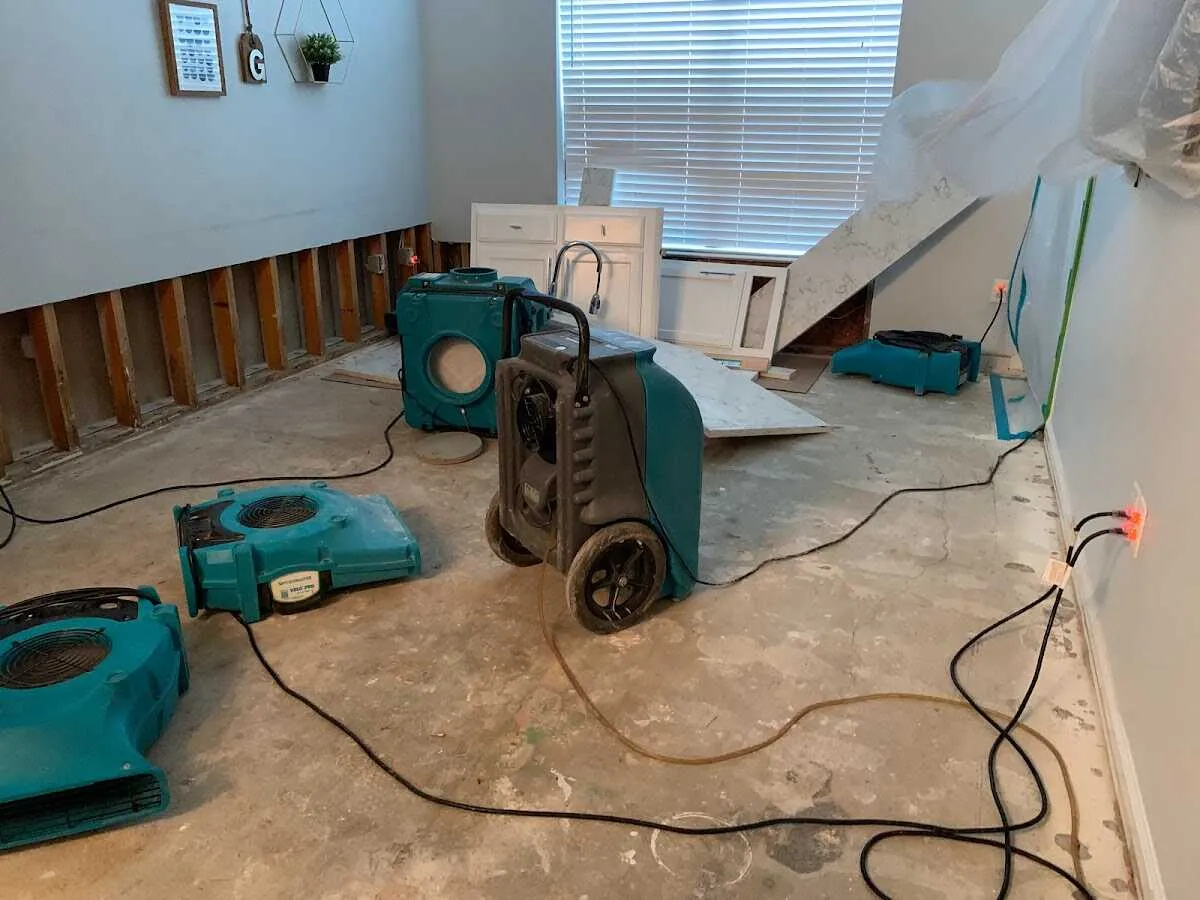 Dehumidifier in flood-cut room for Water Damage Restoration in City of Orange